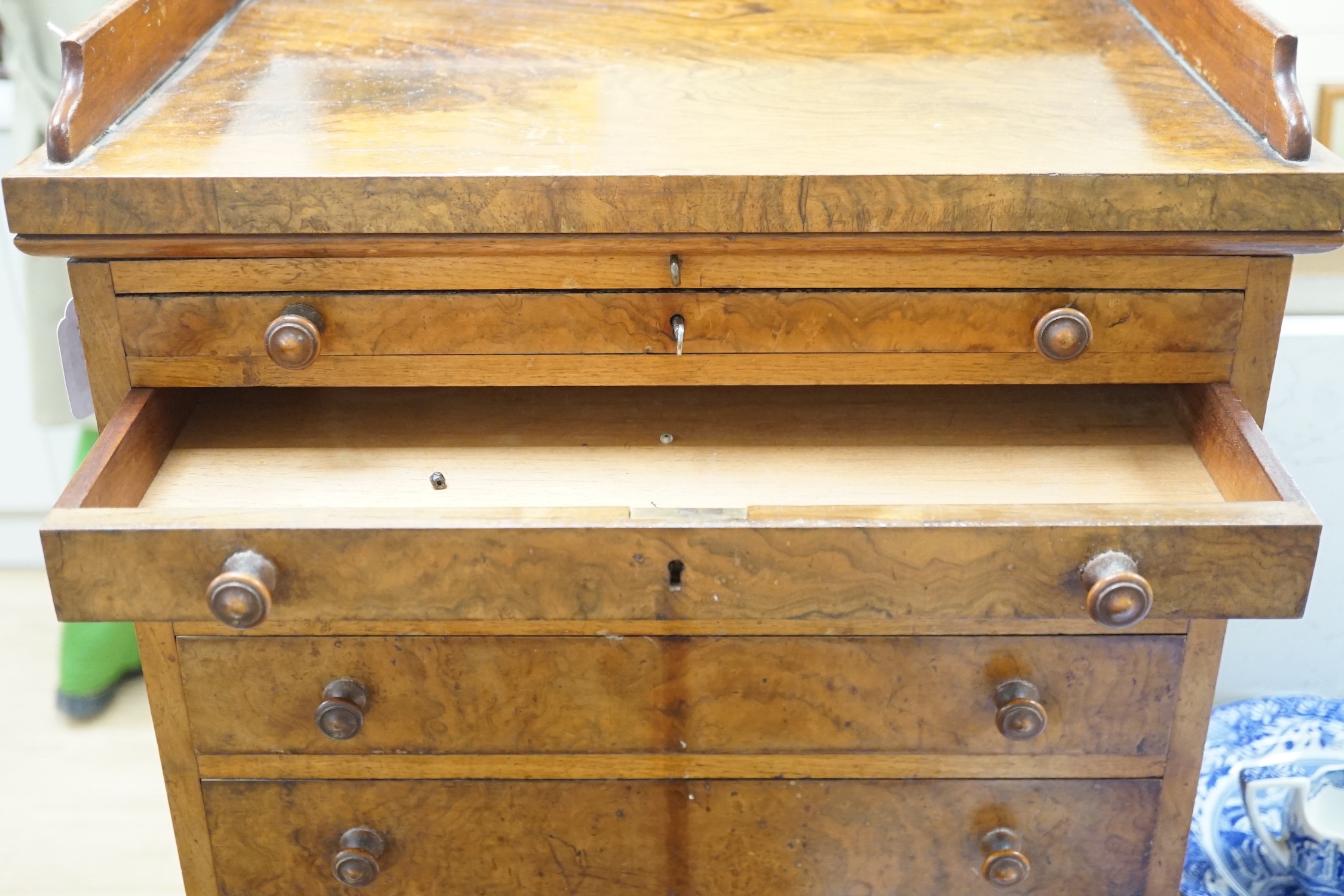 A Victorian walnut six drawer table top miniature collector’s chest, 58cm tall